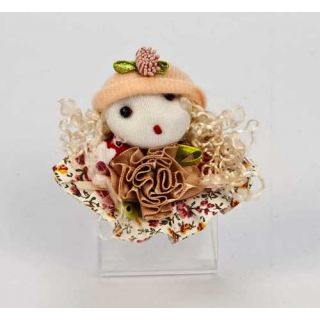 Broche mu&ntilde;eca gorra rosa