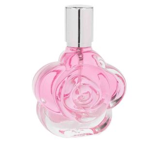 Frasco con perfume de rosas, con forma de flor de rosa