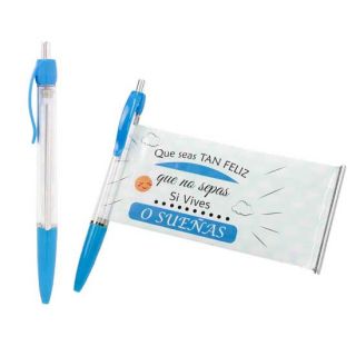 Bolígrafo azul con un mensaje enrollado de “felicidad”