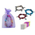 Pulsera de nacar con abalorios y bolsa de tul