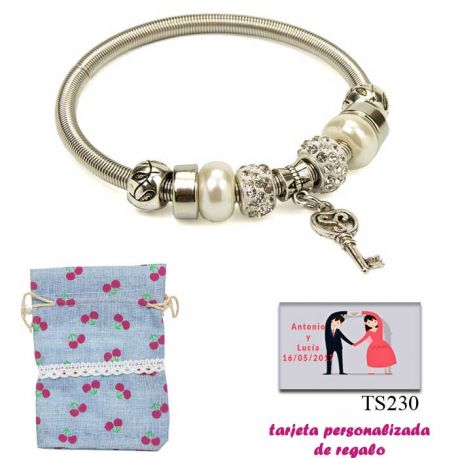 Pulsera con perlas, abalorios y brillantes y colgante con llave corazón