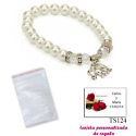 Pulsera de perlas blancas y abalorios con brillantes, y un colgante de elefante