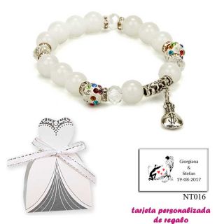 Pulsera de perlas blancas con brillantes de colores y saco de dólar