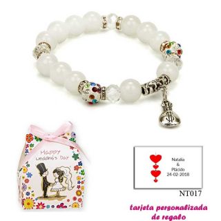 Pulsera de perlas blancas con brillantes de colores y saco de dólar